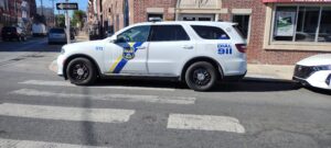 Cop parked in front of bank